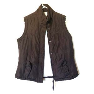 Chocolate brown vest.
